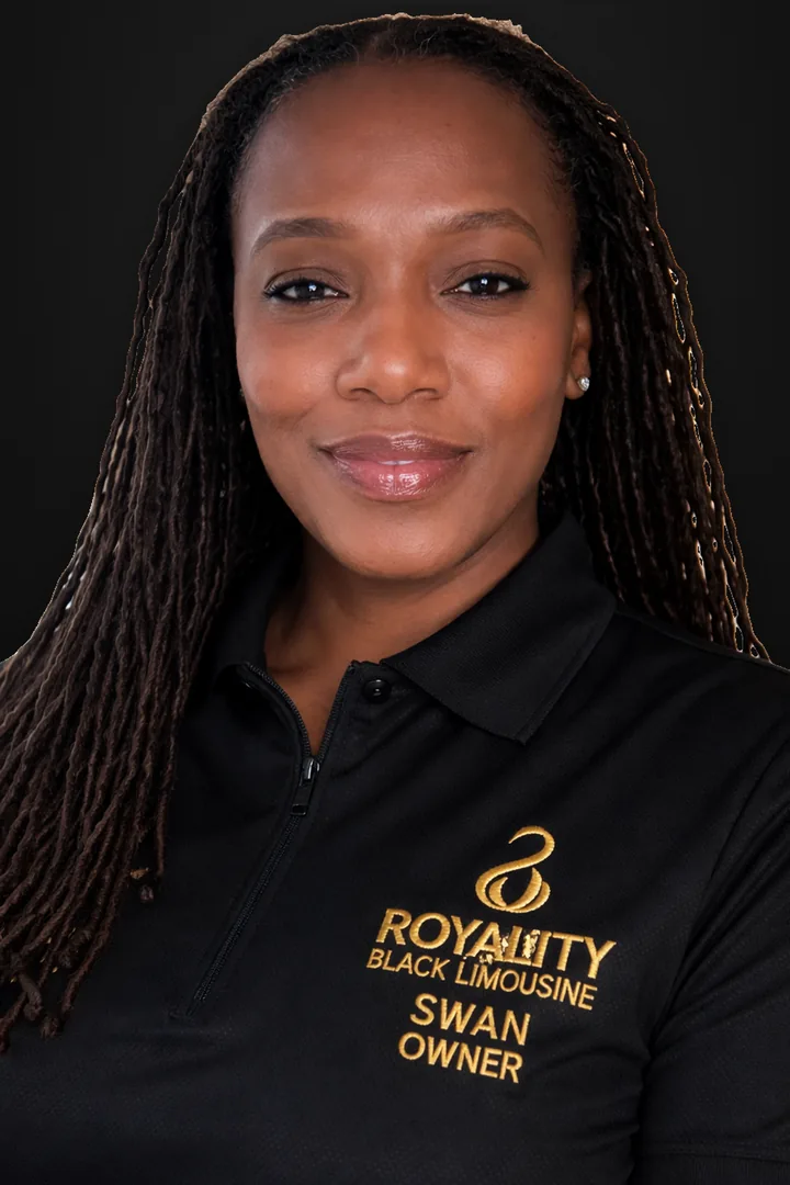 Swan, owner of Royalty Black Limousine, in a black polo with the company's gold logo